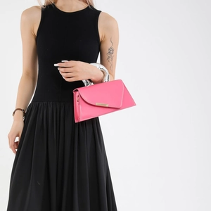 Chic pink trapezoid handbag with silver ring handle and gold metallic trim