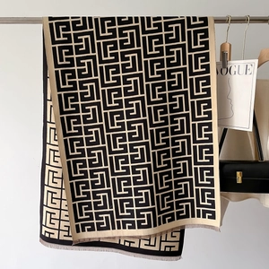 Winter faux cashmere scarf with black and beige geometric maze patterns and tassels