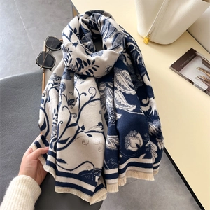Elegant floral print shawl for women featuring blue vine patterns and tassel fringe details