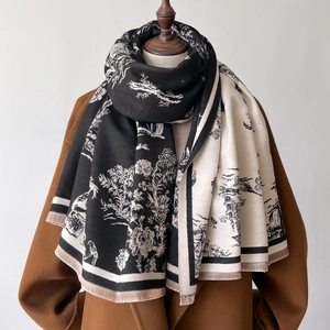 Classic Toile de Jouy patterned faux cashmere scarf with fringes on a wool coat