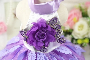 Detail of purple pet wedding dress featuring mesh rose flower and lace embroidery