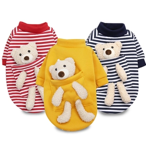 Close-up of three striped pet hoodies featuring a cute 3D plush bear in the back pocket