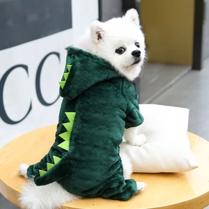 Detail of green dinosaur pet hoodie with soft coral fleece texture and 3D back scales