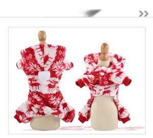 Detailed view of plush red Christmas pet pajamas with reindeer and snowflake patterns