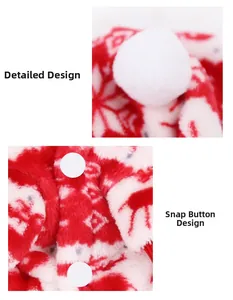 Detail of soft fleece pet Christmas outfit with white pom-pom and snap button closure