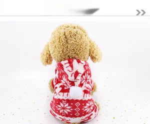 Close-up of red flannel pet costume with reindeer and snowflake Christmas patterns