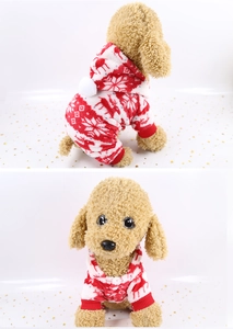 Detail of Christmas reindeer flannel dog hoodie with snowflake pattern and plush pompom