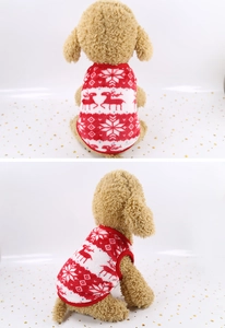 Detail showing the festive elk and snowflake patterns on the plush pet Christmas vest
