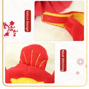 Detail of red fleece pet hat with adjustable Velcro fastener and neat yellow stitching