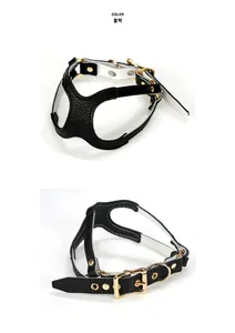 Detail view of black leather pet harness with gold hardware and contrast stitching