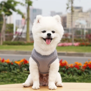 Close-up of grey breathable cotton dog vest showing hem stitching and soft knit texture