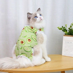 Detail of avocado print pet recovery suit on a cat, soft breathable fabric for cats