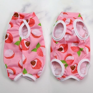 Detailed view of pink cotton pet surgery recovery vest with red lychee pattern print
