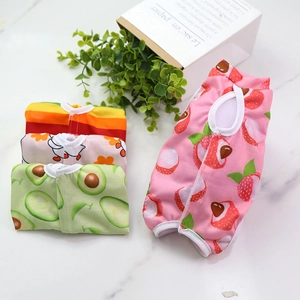 Detailed set of four breathable cotton pet recovery vests with fruit and rainbow patterns