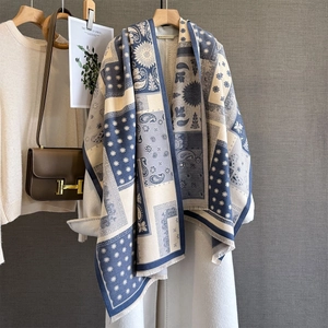 Winter faux cashmere scarf featuring color-block paisley jacquard and fringed edges