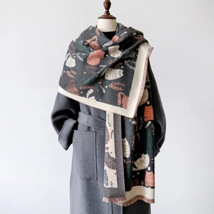 Cat pattern cashmere-like scarf shawl with tassels shown on a mannequin with gray coat
