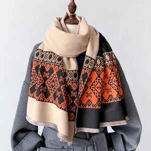 Thick autumn-winter geometric shawl with orange and black ethnic patterns and fringe