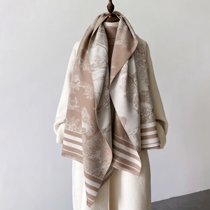 Detailed view of winter warm shawl with vintage landscape print and fringe trim