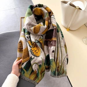 Thick warm shawl with yellow butterfly and green leaf patterns and tassel edges