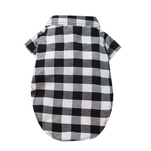 Close-up of black and white checkered pet shirt with polo collar and short sleeves