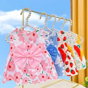 Cute pet summer dresses with floral patterns and large bows for small dogs and cats