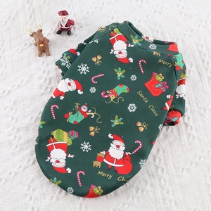 Detail of green fleece Christmas pet hoodie with festive prints for small and large dogs