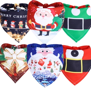 6-pack Christmas themed dog bandanas with festive Santa and penguin prints on soft fabric