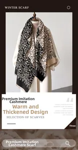Detail of cashmere-like winter scarf featuring elegant black and white botanical vine print