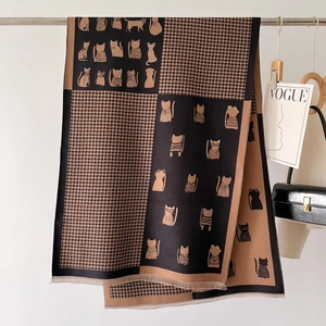Winter scarf featuring cat illustrations and houndstooth pattern with soft fringes