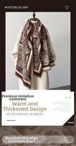 Close-up of thick imitation cashmere scarf featuring vintage leaf and tassel details