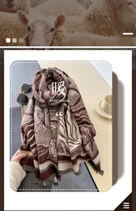 Detailed view of thick cashmere-like scarf featuring leaf patterns and fringe tassels