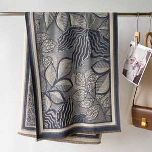 Detailed texture of thick leaf pattern cashmere scarf with delicate short tassels