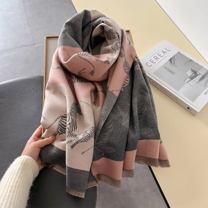 Close-up of zebra pattern scarf showing soft cashmere texture and delicate fringe details
