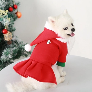 Detail of red fleece Christmas pet dress with snowman buttons and festive white collar