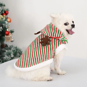 Detail of Christmas reindeer hoodie with soft fleece antlers on a white Pomeranian dog