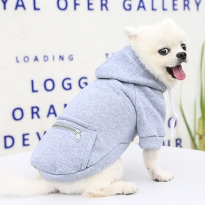 Detail of grey dog hoodie featuring a functional zipper pocket and soft knit fabric
