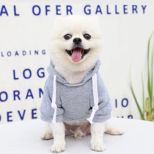 Detail of gray pet hoodie featuring white drawstrings and knitted fabric for small dogs