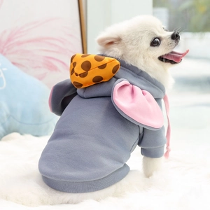 Detail of gray fleece pet hoodie featuring elephant ears and giraffe pattern hood