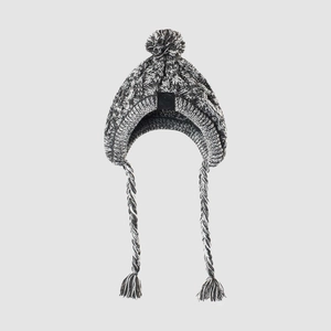 Detail of warm grey knit pet hat featuring soft pompom and ear flaps with tassels