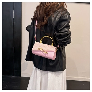 Pink PU leather handbag with metallic arc handle and woven texture detail flap