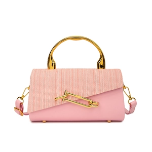 Pink PU leather and tweed handbag with gold circular handle and safety pin buckle