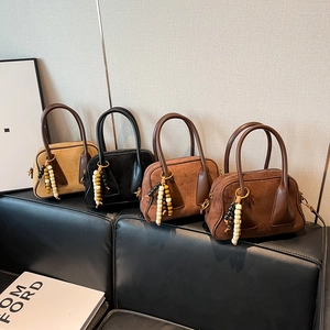 Retro suede Boston handbags set in yellow, black, red, and brown with bead charms