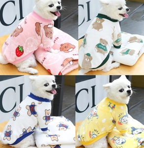 Detail of four colorful thickened fleece pet hoodies with bear prints for small dogs