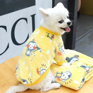 Detail of yellow fleece dog sweater featuring cartoon print and ribbed cuffs for warmth