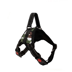 Close-up of camouflage dog harness with reflective stitching and safety locking buckles