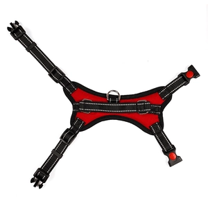 Macro detail of red and black dog harness with reflective stitching and D-ring