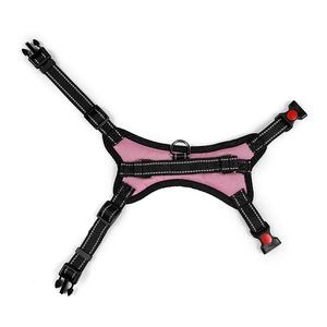 Pink dog harness with reflective stitching and adjustable plastic buckles on a white background
