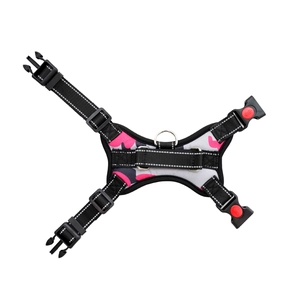 Detail of pink camo dog harness with metal D-ring and secure locking buckle system