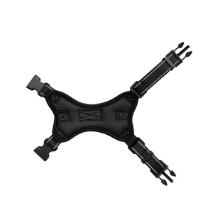 Detail of breathable mesh lining and adjustable nylon straps on black dog harness