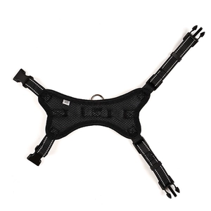 Detail of black pet harness with breathable mesh, reflective strips and adjustable buckle